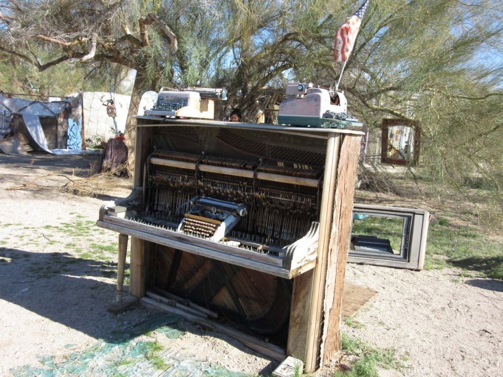 Piano and typewriters at East Jesus sculpture park Slab City CA