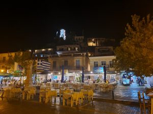 Poros and its clock tower by night