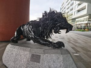 Sculpture of a black lion made from old tyres on the banks of the Danube in Bratislava