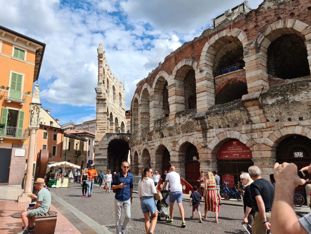 Roman collosseum in Verona with pedestrains walking by