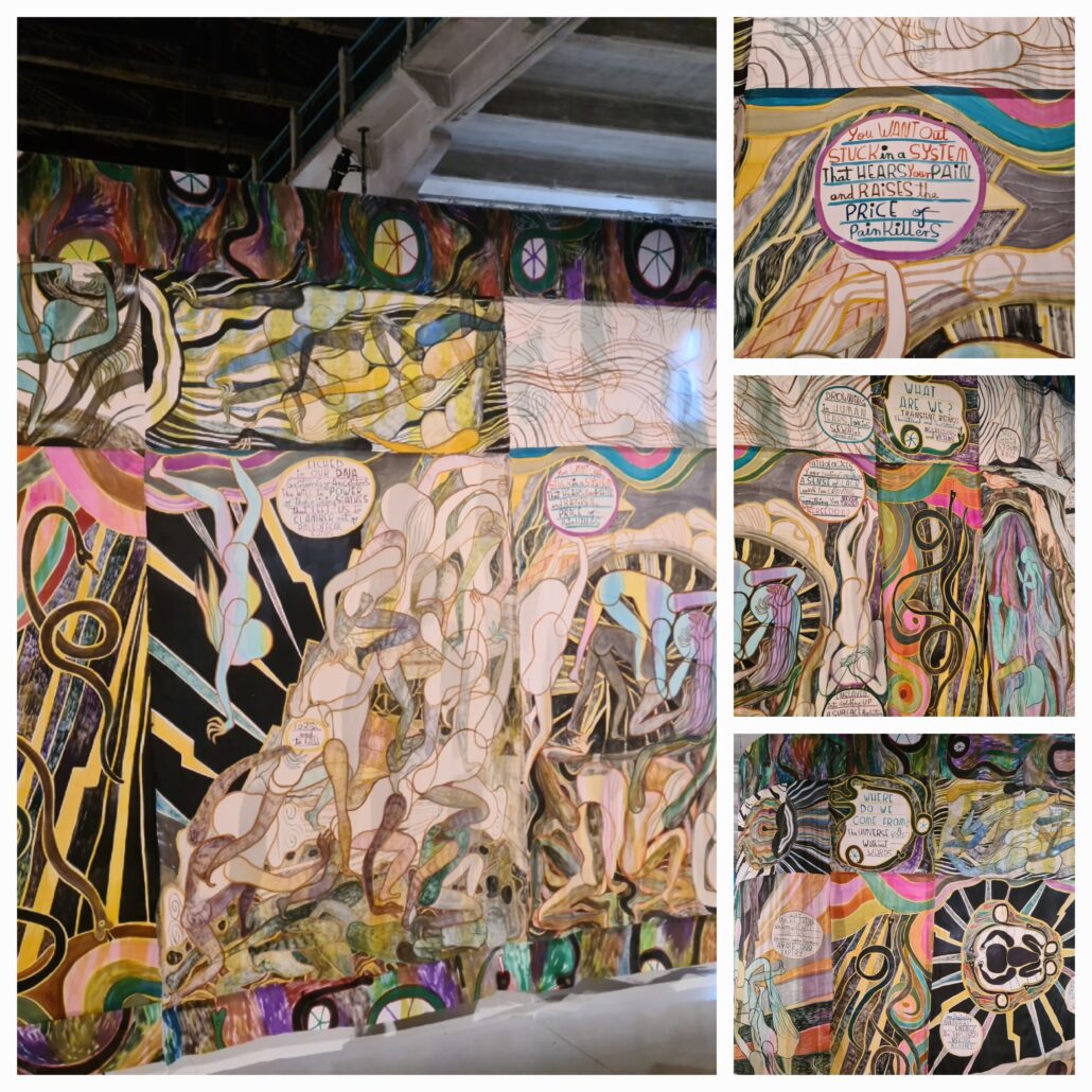 A huge series of link tie-died curtains depicting sea creatures in muted tones of grees and blues and pinks and yellows. The collage of four pictures shows extracts from the big piece. In the top left piece there's a speech bubble with the text: you want out. Stuck in a system that hears you pain and raises the price of painkillers. Below that is an image of a naked body upside down. At the feet is a speech bubble says : Pathologises your feelings. Promotes a sense of lack. Leaves you craving soething you never tasted. What is freedom? 
