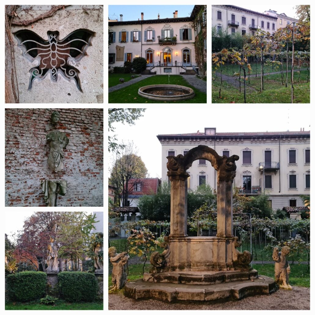 Collage of photos from the garden of a Milanese palance showing 1. the metal grill of an air vent shaped like butterfly; 2. the view of the two-storey palace from the gardens with the sun reflecting on a window and a round flower bed in the foreground; 3. Rows of vines overlooked by a modernist two story white building; 4 the detached head, torso, and legs of a stone statue affixed to a brick wall ; 5. two of three statues in an arc with a hedge in the foreground and autumnal leaves in the background; 6. a stone arch on a plinth with a statue of an angel on either side. A three story building in the background and a smaller one-story building with a red tiled roof off to the side. 