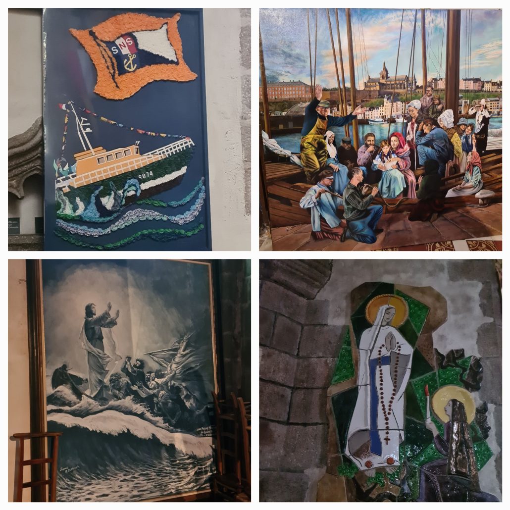 Four images 1) Picture of a ship rolling in the sea made of wool on card. An orange banner on the top ihas a flag inset with the letters SNS and a ship's anchor 2) people sitting around in colorful clothes (dated - period costumes) - a mam holds a girl on her knee - the girl is reading from something and everyone arounds appears to be listening. IN the background across the water on a hill is a large gothic church flanked by stone building. 3) A mosaic image of a lady in qhite with an orange halo and long rosary beads hanging fro her hands which are joined in prayer. She's looking down at a young girl kneeling in front of her. The girl is offering her a candle. 4) a serpia image of a boat rolling in waves with a man standing on deck, arms outstretch, addressing a frighten crew. 