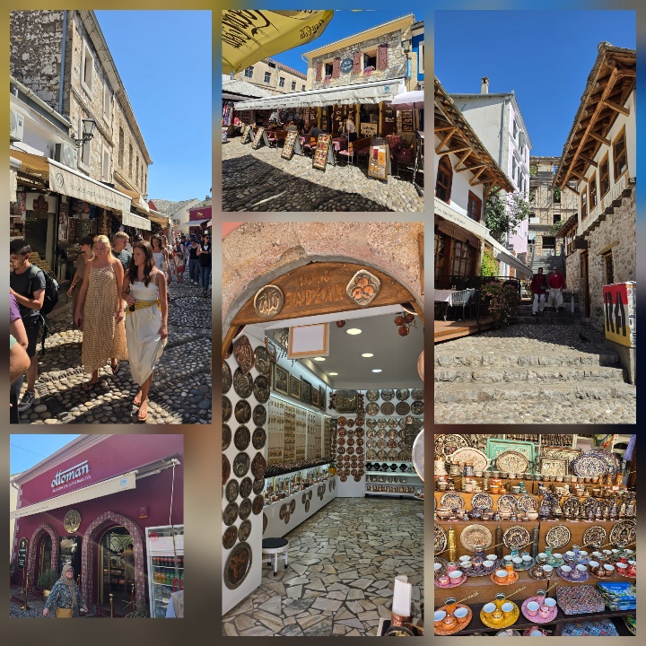 Crowded cobbled streets in Mostar's Old Town lined with shops selling traditional Bosnian ceramics, crafts, souvenirs and textiles.